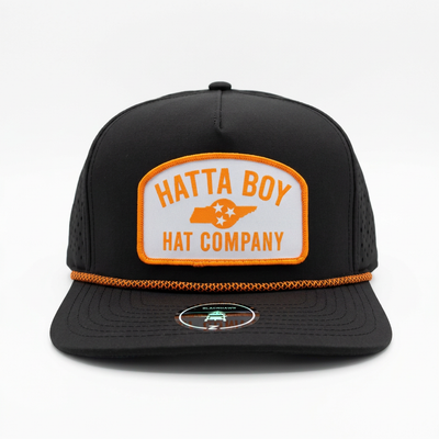 Game Day Performance Black and Orange hat, front view on white